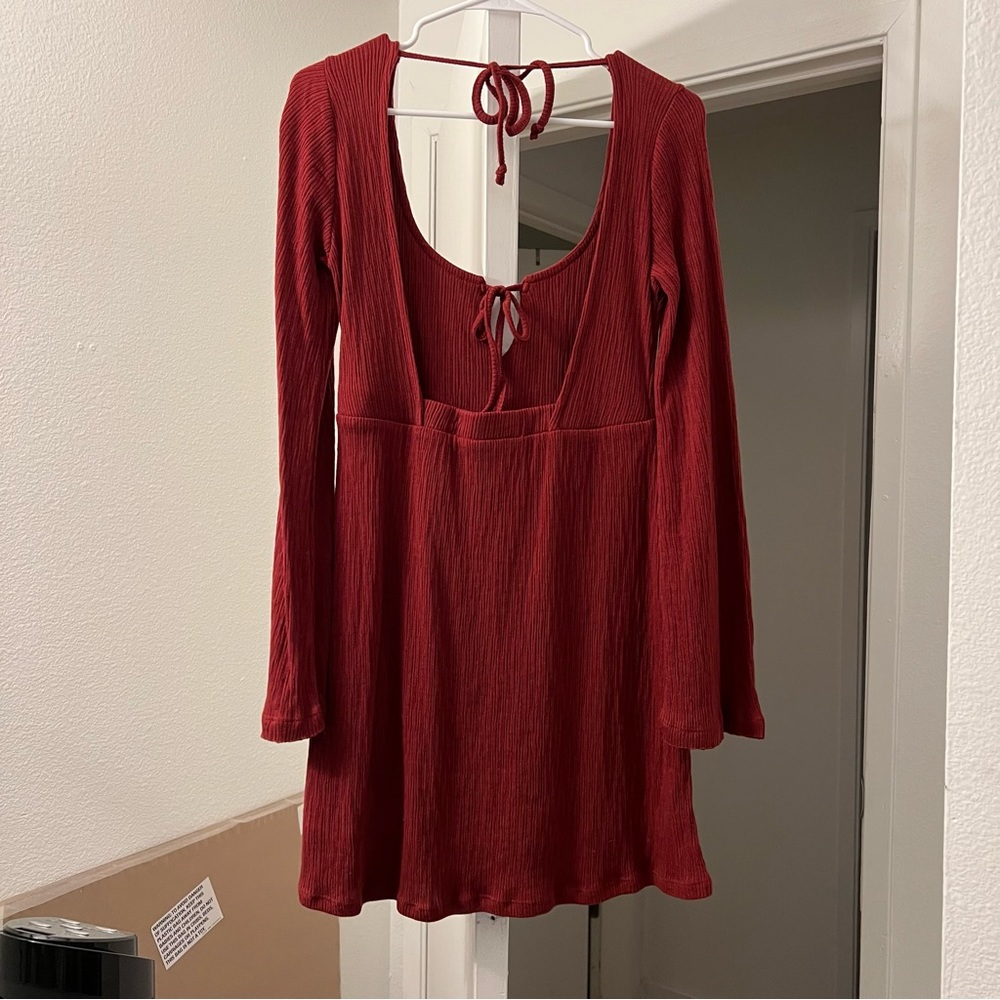 Free People long sleeve dress with open back size M.